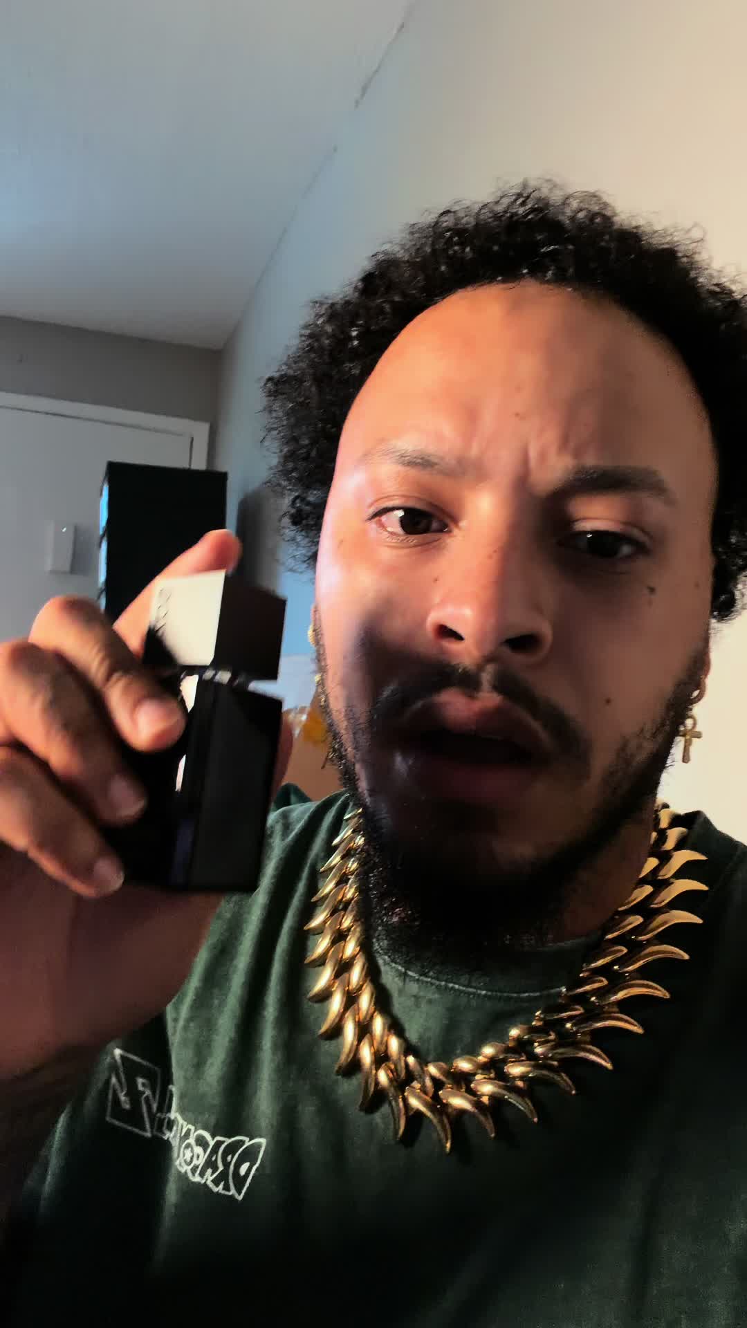 Jujilags holding Charming Blue in his original video